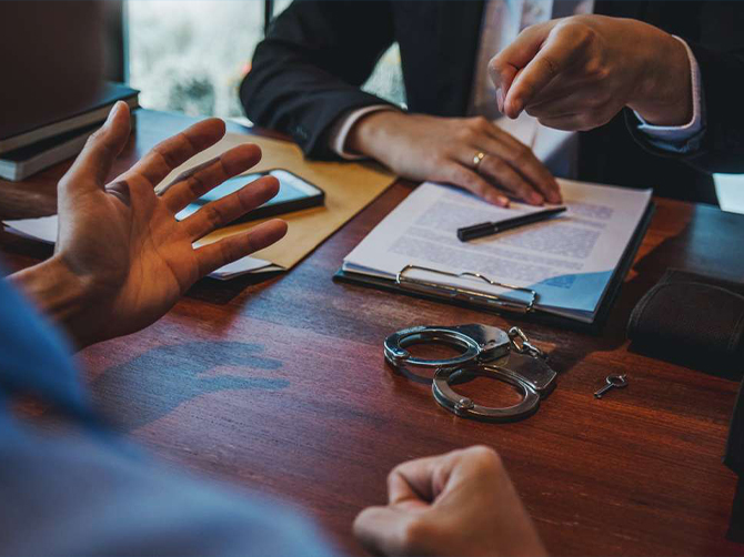 Attorney reviewing real estate documents during a consultation
